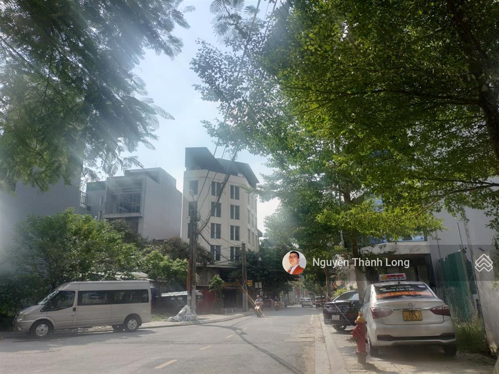 Tòa nhà mặt vườn hoa gần cổ linh, thạch bàn, 100m2, 7 tầng, mt 7m, vỉa hè ô tô tránh, ở và kd tốt.