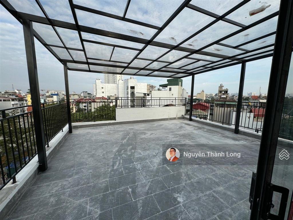 Tòa nhà mặt vườn hoa gần cổ linh, thạch bàn, 100m2, 7 tầng, mt 7m, vỉa hè ô tô tránh, ở và kd tốt.