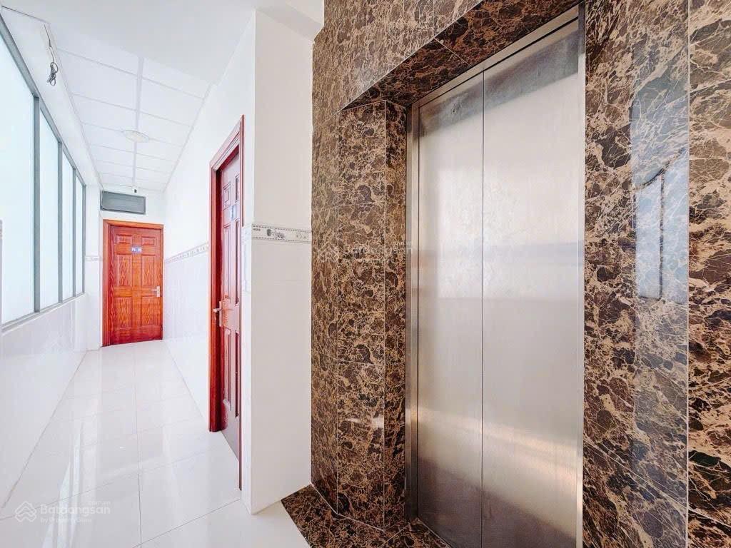 Chdv lâm văn bền, q7, 6 tầng, hầm, đường ô tô, thang máy, 5.5x30m, 140tr/tháng. 20 tỷ
