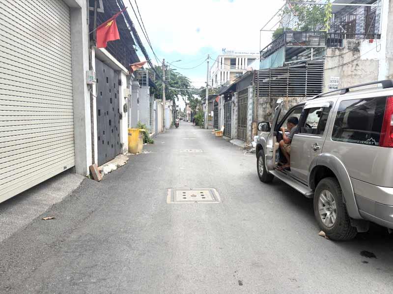 Bán Tòa CHDV 210m² Gần Quốc Lộ 13 – 4 Tầng Thang Máy, 14 Phòng, Dòng Tiền 50 Triệu/Tháng