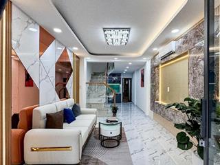 Nhà đẹp ở ngay  4 tầng  đường phan tây hồ  phường 7  phú nhuận.