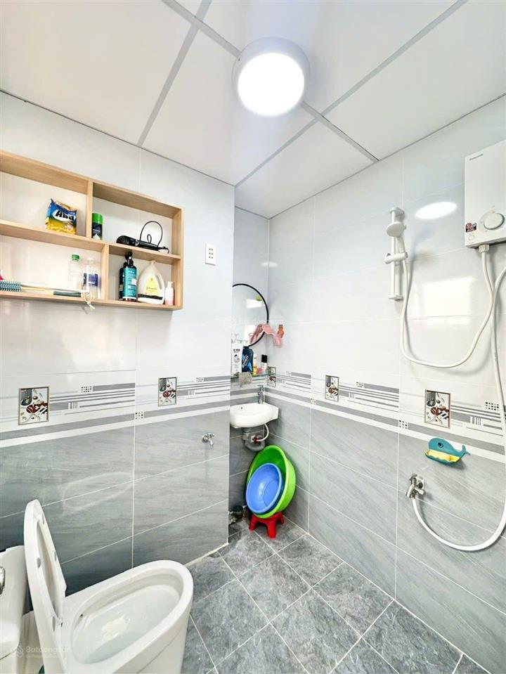 Bán chung cư bình phú 1 căn góc. dt 68m2 có 2pn lầu 1. có sổ hồng riêng