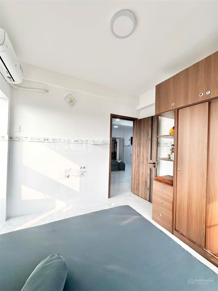 Bán chung cư bình phú 1 căn góc. dt 68m2 có 2pn lầu 1. có sổ hồng riêng