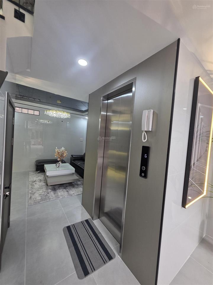 Nhà xây mới full nội thất có thang máy, hẻm xe hơi 106b/25 đường lạc long quân