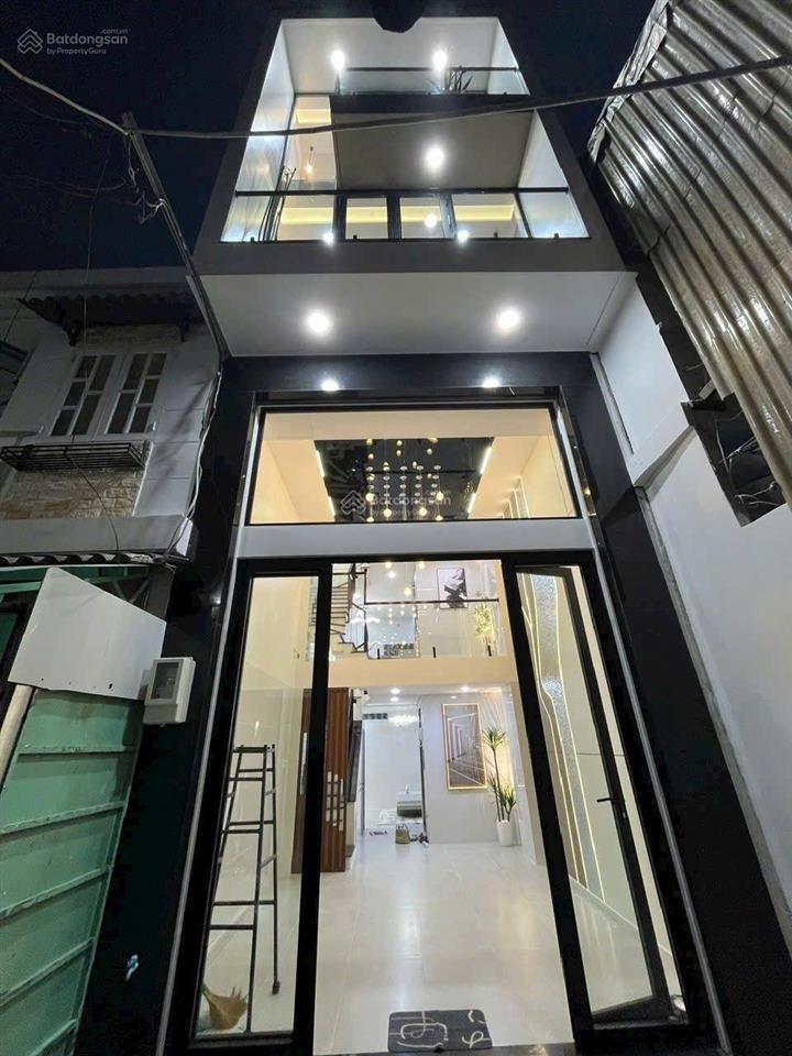 Nhà xây mới full nội thất có thang máy, hẻm xe hơi 106b/25 đường lạc long quân