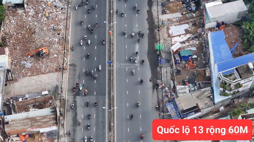 Bán tòa căn hộ sát bên quốc lộ 13 mở rộng ngang khủng 10.8m 215m2 cn sổ kế bên ga metro.