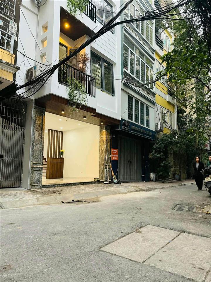 Bán nhà thái hà gần rạp phim quốc gia diện tích 65m2 lô góc 2 mặt tiền vỉa hè 1m ô tô tránh đỗ