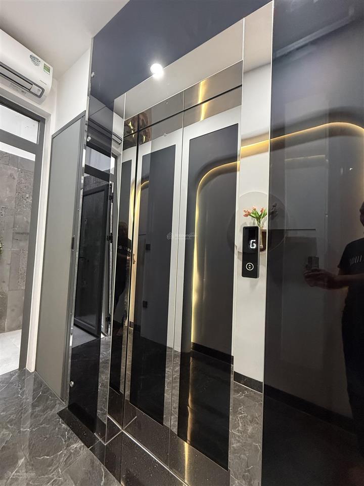 Hẻm 6m xe hơi thông  nhà sấy mới 100% thang máy cảm ứng giá rẻ
