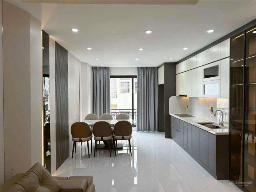 Nhà định công  thang máy  gara ô tô  kinh doanh sầm uất  hơn 13 tỷ