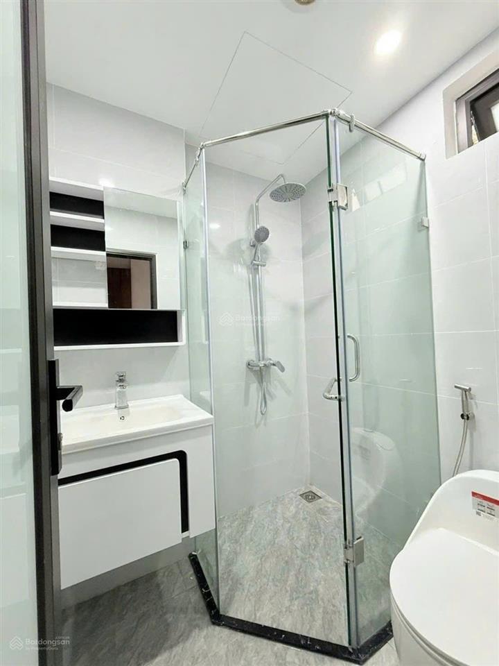 Nhà định công  thang máy  gara ô tô  kinh doanh sầm uất  hơn 13 tỷ
