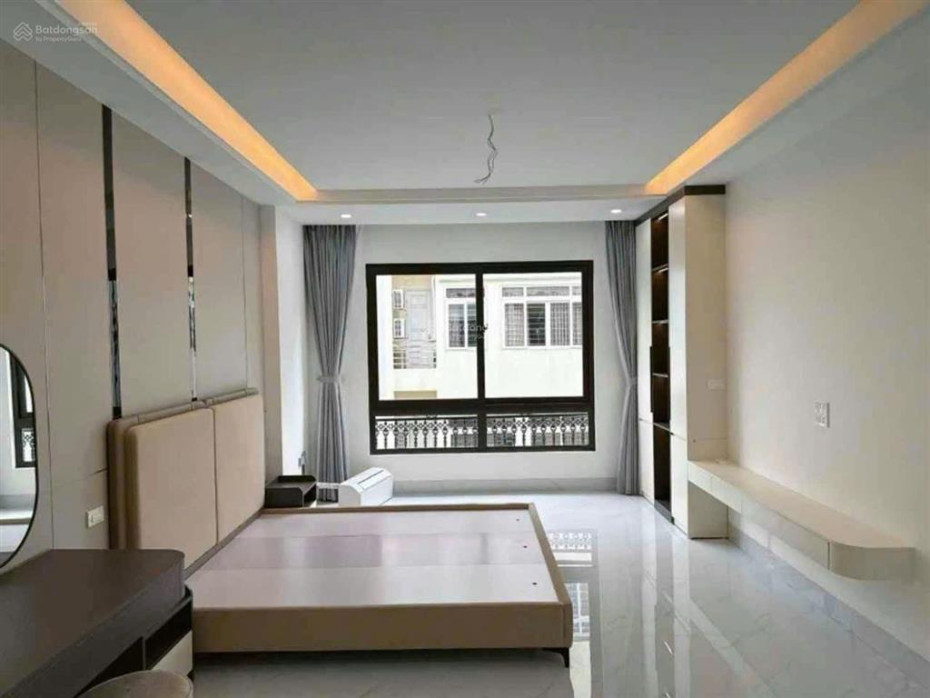 Nhà định công  thang máy  gara ô tô  kinh doanh sầm uất  hơn 13 tỷ