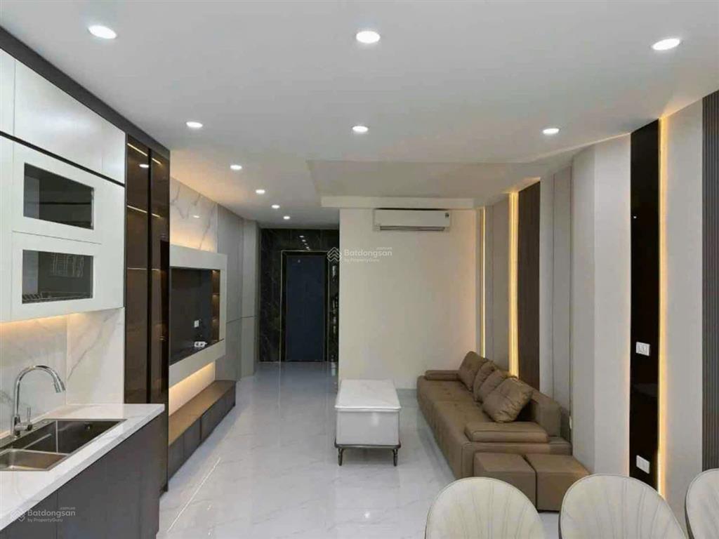 Nhà định công  thang máy  gara ô tô  kinh doanh sầm uất  hơn 13 tỷ
