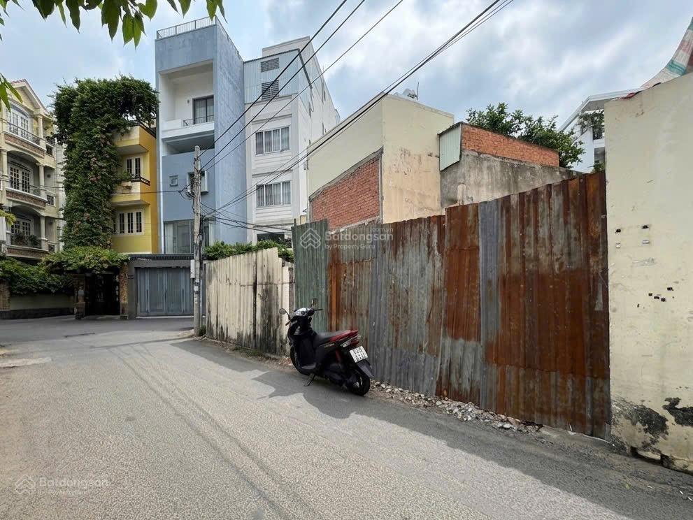 Lê quang định, bình thạnh  hẻm ô tô tránh  60m2 ( nở hậu 6 x 17)  quy mô xây dựng 7 tầng