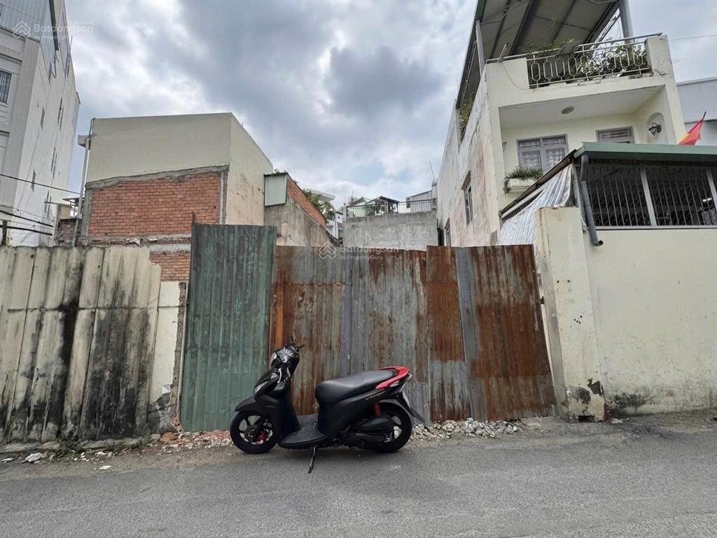 Lê quang định, bình thạnh  hẻm ô tô tránh  60m2 ( nở hậu 6 x 17)  quy mô xây dựng 7 tầng