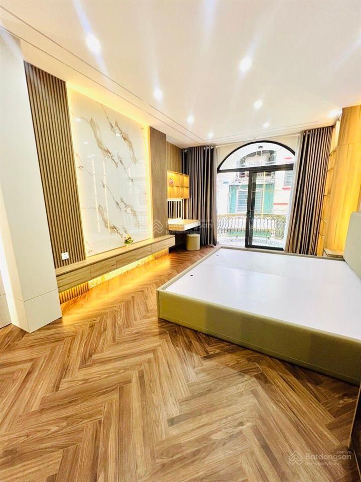 Anh vợ nhờ bán nhà cách mặt phố giải phóng đúng 2 nhà 55 m2  6 tầng thang máy mới koong  dá 19.8