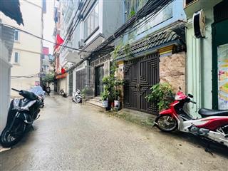 Nhà phố hồng mai  ô tô đỗ cửa  hai mặt ngõ thông trước sau  sân cổng riêng  kinh doanh  sổ đỏ