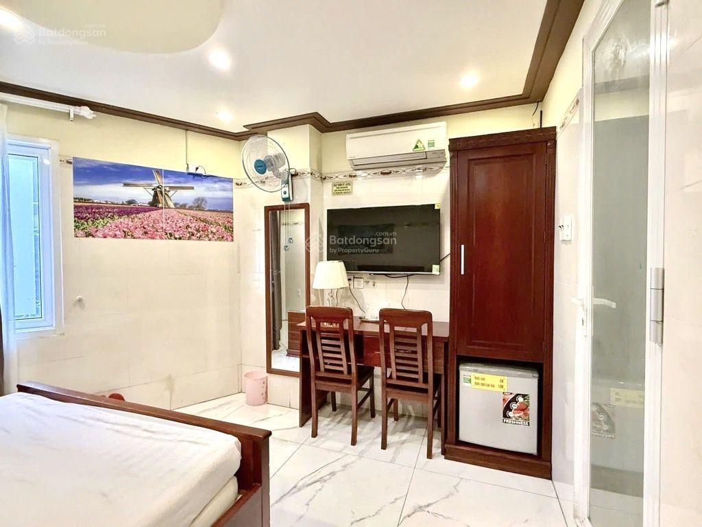 Bán chdv ngang 7m 6 tầng hầm thang máy dòng tiền 2 tỷ/năm 3x tỷ đường 8m kdc kiều đàm quận 7
