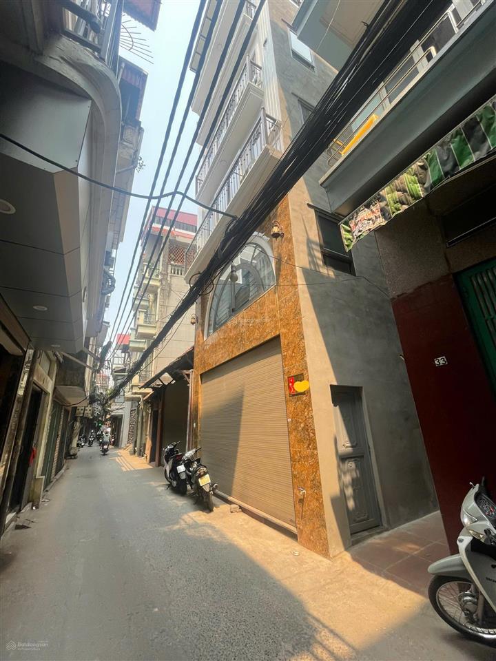 Nhà mặt ngõ lô góc 18 tỷ 40m2 6 tầng mt 5,5m thang máy gara ô tô kinh doanh minh khai hai bà trưng