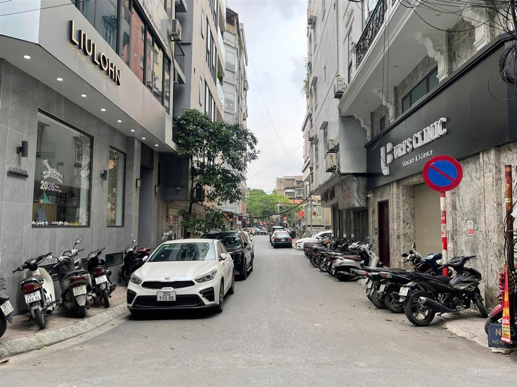 Bán nhà lô góc phân lô 54 tỷ 72m 7 tầng mt 7m thang máy vỉa hè ô tô tránh nguyên hồng đống đa