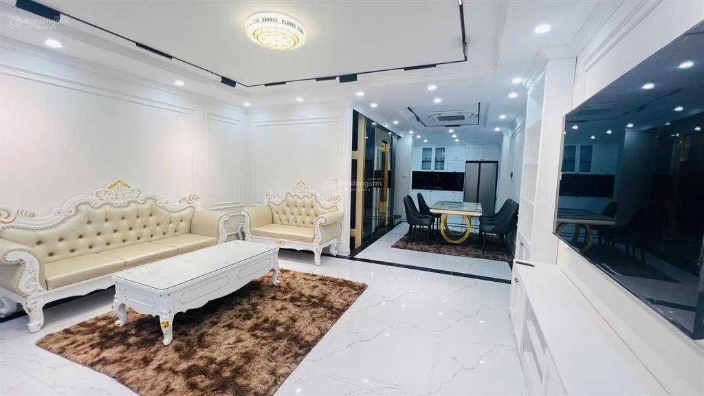 Hoàng văn thái 23,5 tỷ mặt tiền 6,7m gara 2 ô tô 6 tầng thang máy