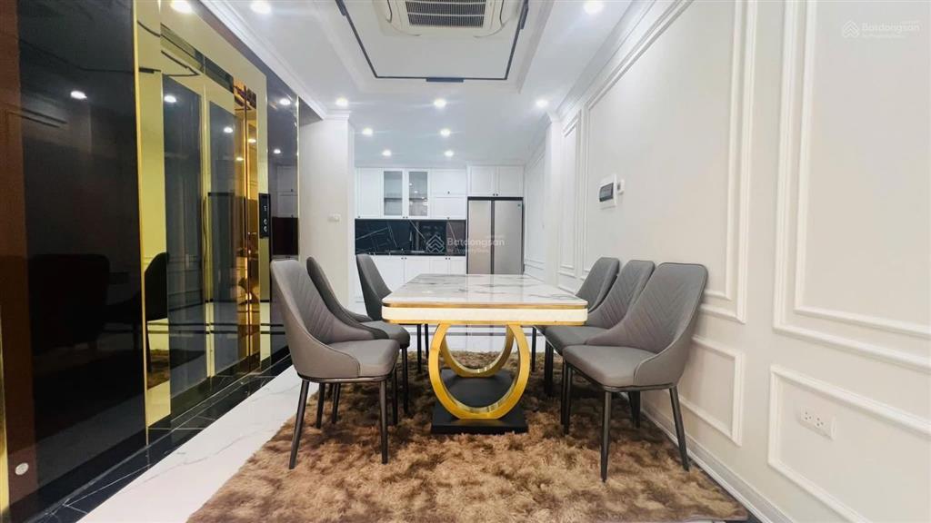 Hoàng văn thái 23,5 tỷ mặt tiền 6,7m gara 2 ô tô 6 tầng thang máy
