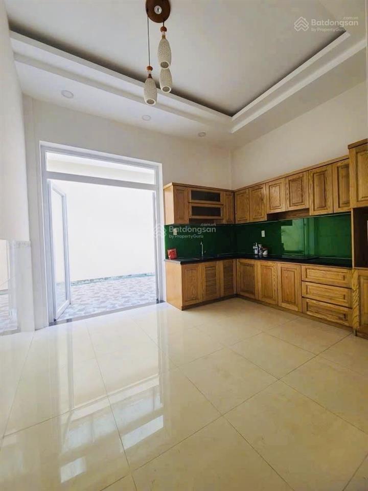 Mặt tiền đường bàn cờ 50m ra trường chinh q12nhà đẹp 4 tầngdt 4m x 25mxe tải thông