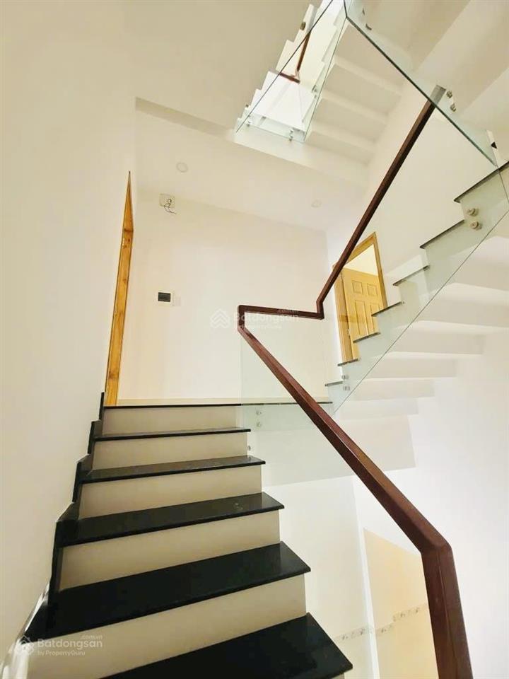 Mặt tiền đường bàn cờ 50m ra trường chinh q12nhà đẹp 4 tầngdt 4m x 25mxe tải thông