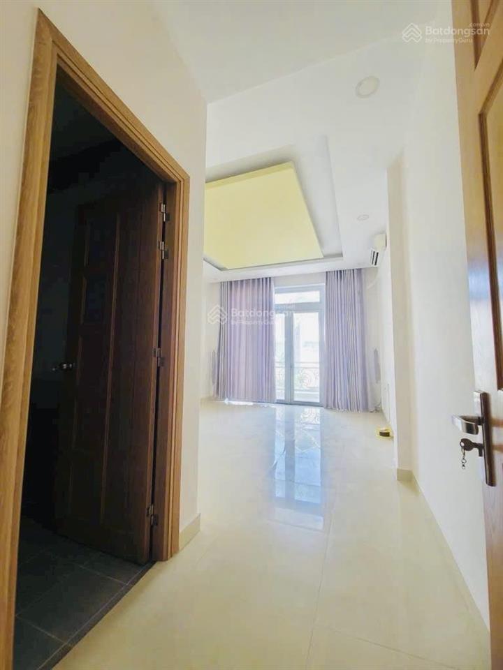 Mặt tiền đường bàn cờ 50m ra trường chinh q12nhà đẹp 4 tầngdt 4m x 25mxe tải thông