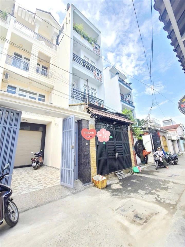 Mặt tiền đường bàn cờ cách 50m ra trường chinh p.đông hưng thuận q12 nhà đẹp 4 tầngdt 4m x 25m