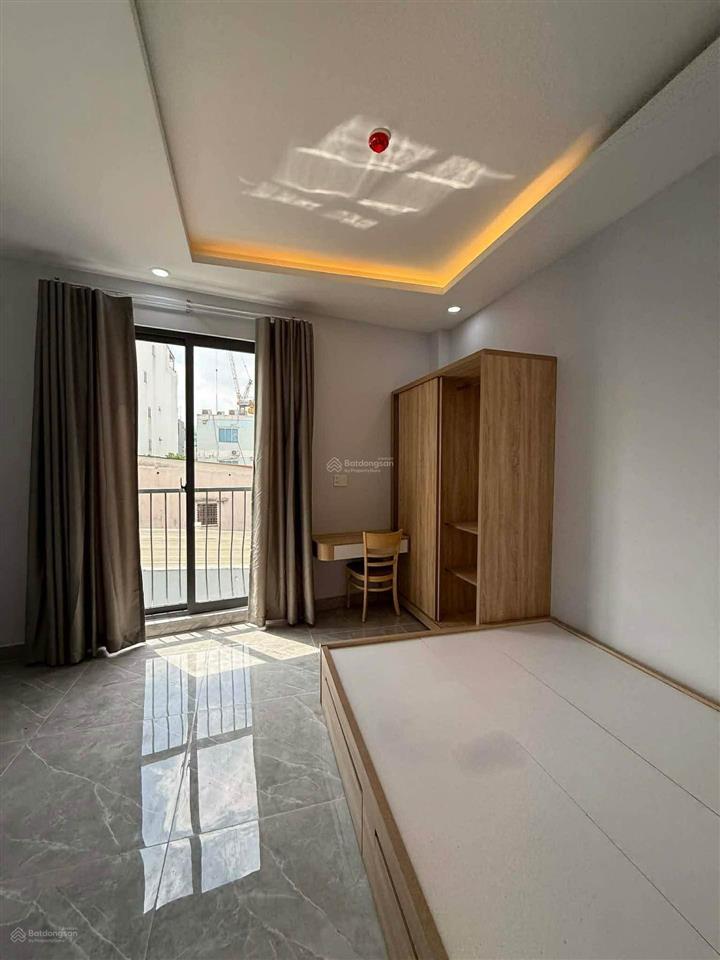 Quận phú nhuận  đường phan xích long  60m2  ngang 4,5m  4 tầng  5pn  nở hậu nhẹ  thang máy