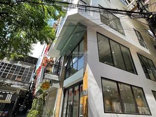 Bán nhà mặt phố thịnh hào 1,tt đống đa,lô góc,5 ô tô tránh,kinh doanh,7t thang máy 42m 22 tỷ