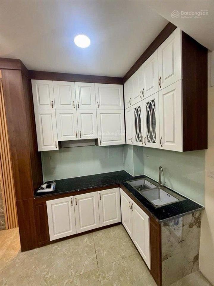 Nhà mới cứng 32m 5 tầng  mặt ngõ bằng b  linh đàm  tiện tích  gần chợ trường  10m ôtô tránh