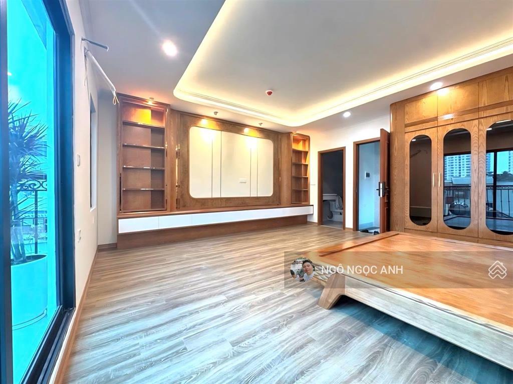 Mặt ngõ thông giải phóng oto tránh kinh doanh  38m 6 tầng thang máy mt5m  gara oto vào nhà