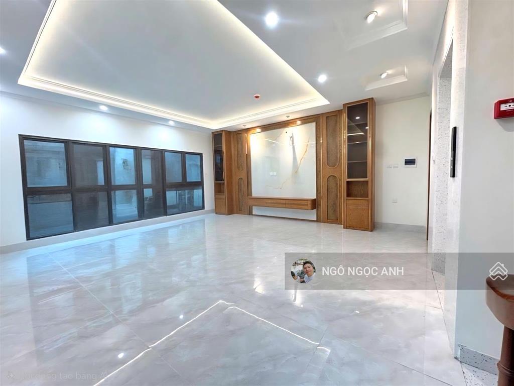 Mặt ngõ thông giải phóng oto tránh kinh doanh  38m 6 tầng thang máy mt5m  gara oto vào nhà