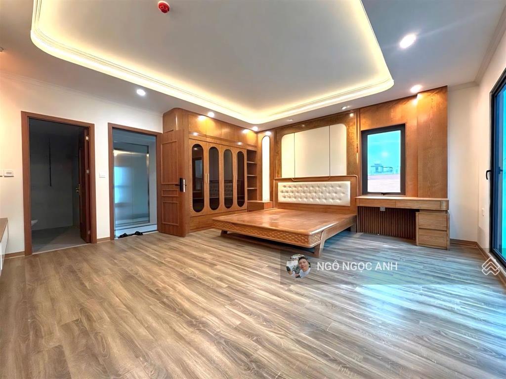 Mặt ngõ thông giải phóng oto tránh kinh doanh  38m 6 tầng thang máy mt5m  gara oto vào nhà