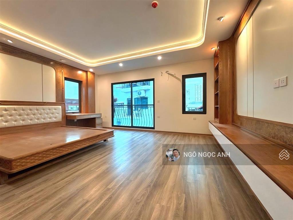 Mặt ngõ thông giải phóng oto tránh kinh doanh  38m 6 tầng thang máy mt5m  gara oto vào nhà