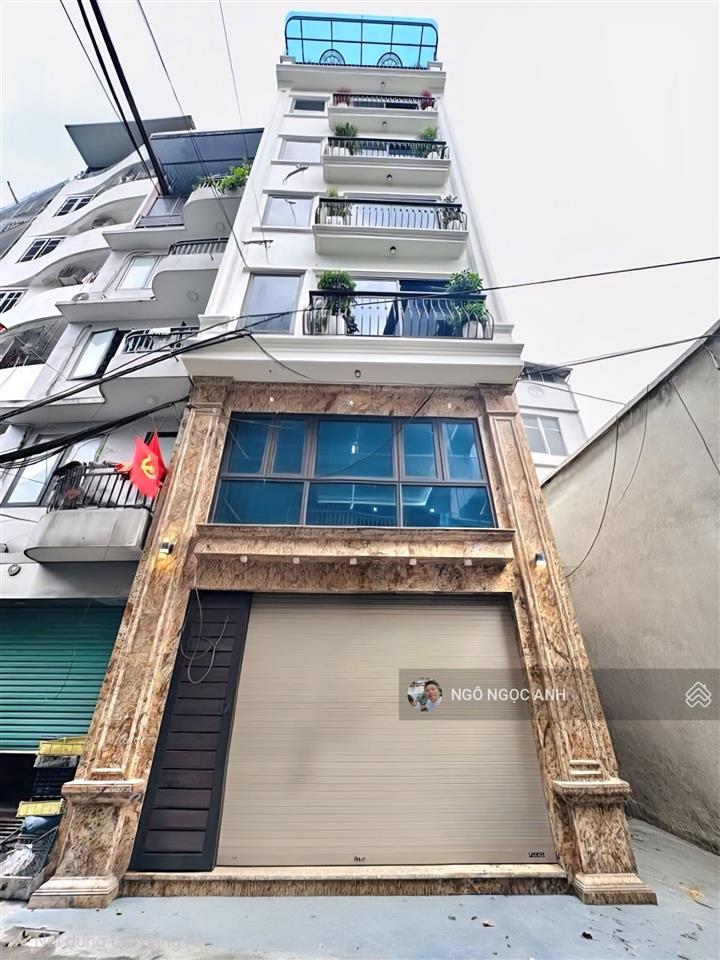 Mặt ngõ thông giải phóng oto tránh kinh doanh  38m 6 tầng thang máy mt5m  gara oto vào nhà