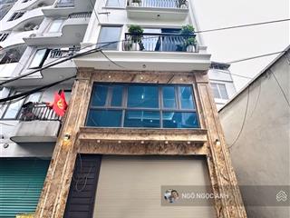 Mặt ngõ thông giải phóng oto tránh kinh doanh  38m 6 tầng thang máy mt5m  gara oto vào nhà