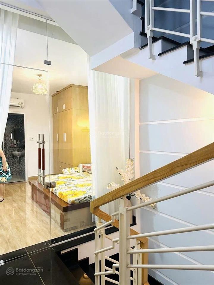 Bán nhà mới 4 tầng  hẻm oto phan đăng lưu thông phan xích long