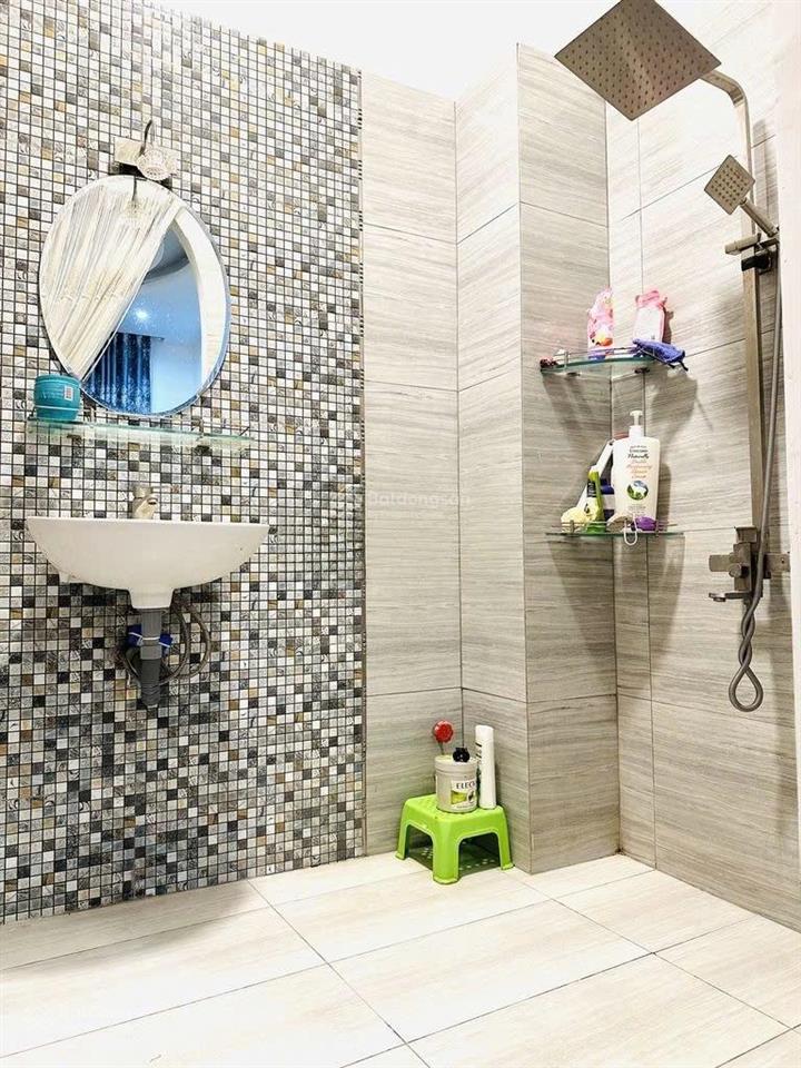Bán nhà mới 4 tầng  hẻm oto phan đăng lưu thông phan xích long