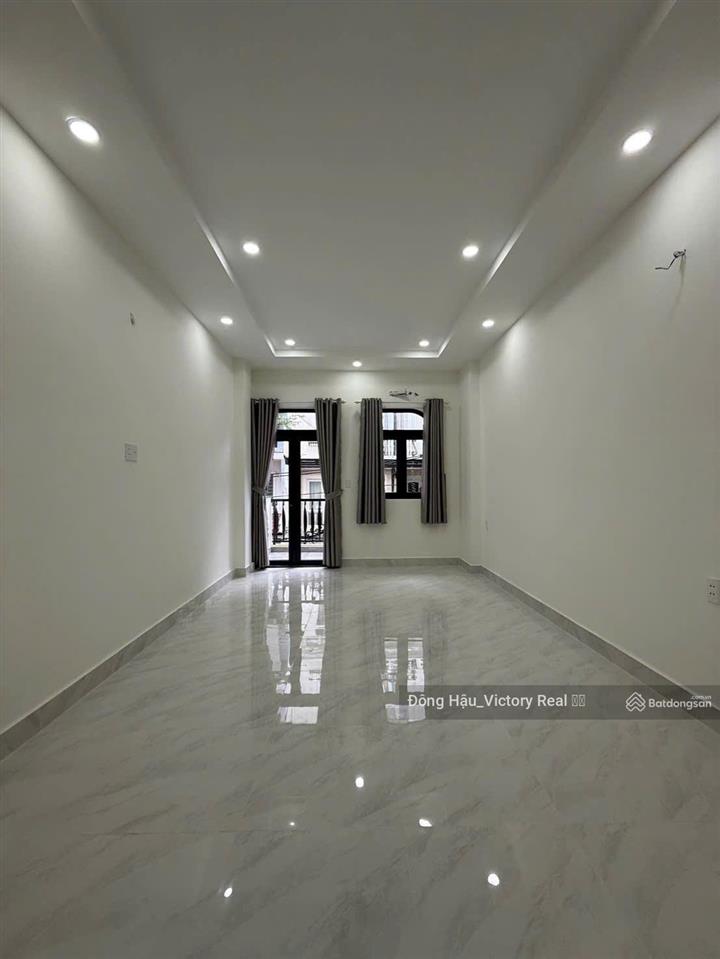 Bán nhà mới  hxh 7m giải phóng  khu sân bay  4 tầng  giá 11.2 tỷ tl