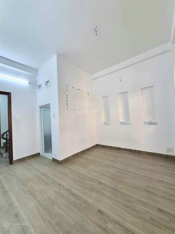 Nhà 2 lầu + sân thượng 68.1m2 hẻm xe hơi thông đường số 51, gần bờ kênh