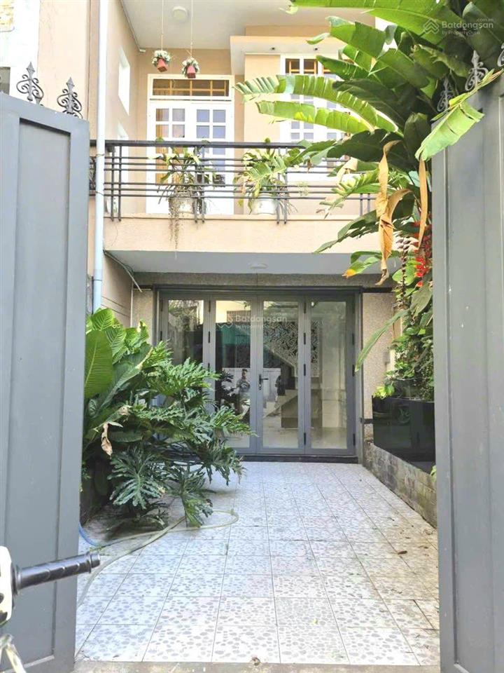 Nhà 2 lầu + sân thượng 68.1m2 hẻm xe hơi thông đường số 51, gần bờ kênh