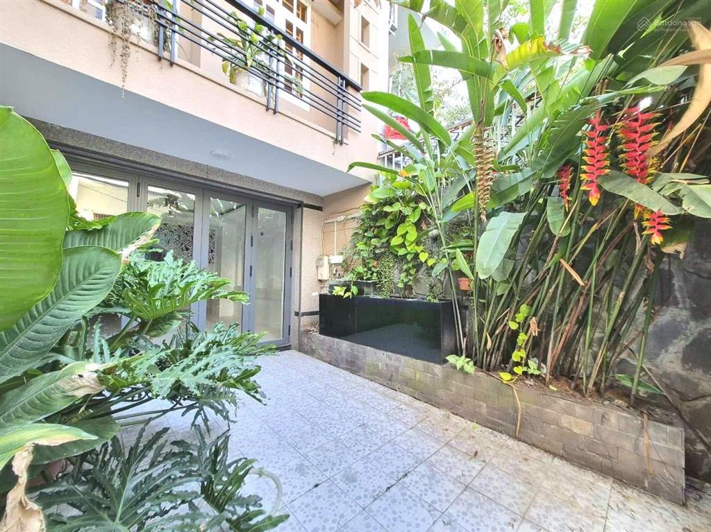 Nhà 2 lầu + sân thượng 68.1m2 hẻm xe hơi thông đường số 51, gần bờ kênh