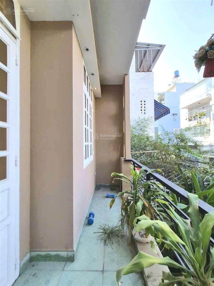 Nhà 2 lầu + sân thượng 68.1m2 hẻm xe hơi thông đường số 51, gần bờ kênh