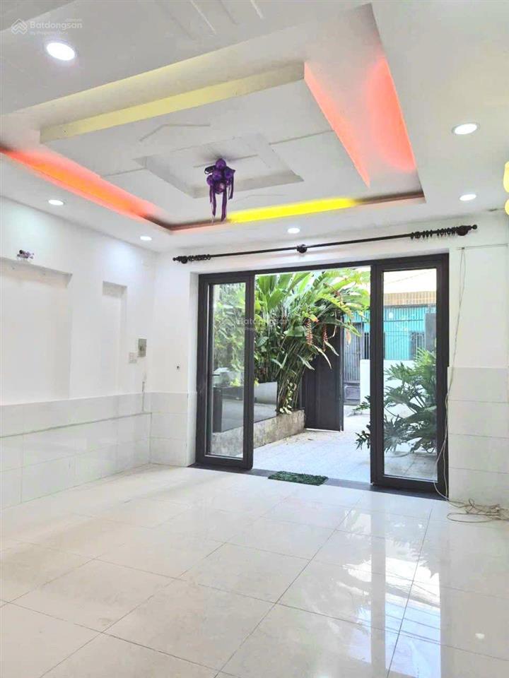 Nhà 2 lầu + sân thượng 68.1m2 hẻm xe hơi thông đường số 51, gần bờ kênh