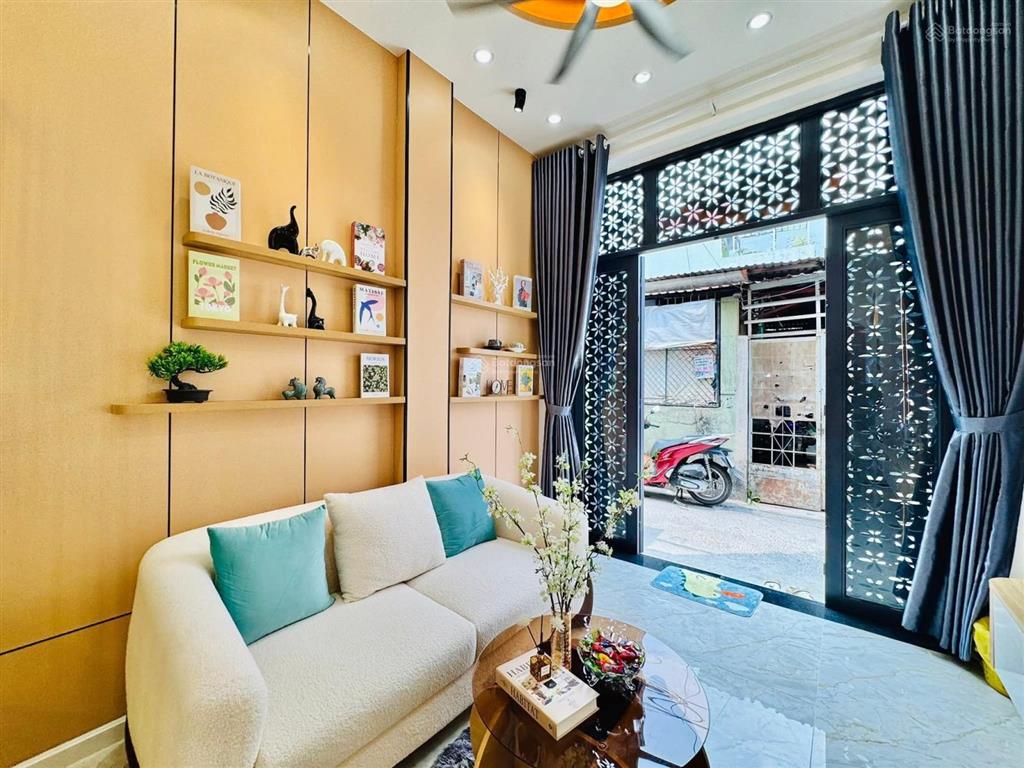 Nhà 2 lầu 24.7m2 hẻm xe hơi thông, ngay trục đường dương quảng hàm và nguyễn thái sơn