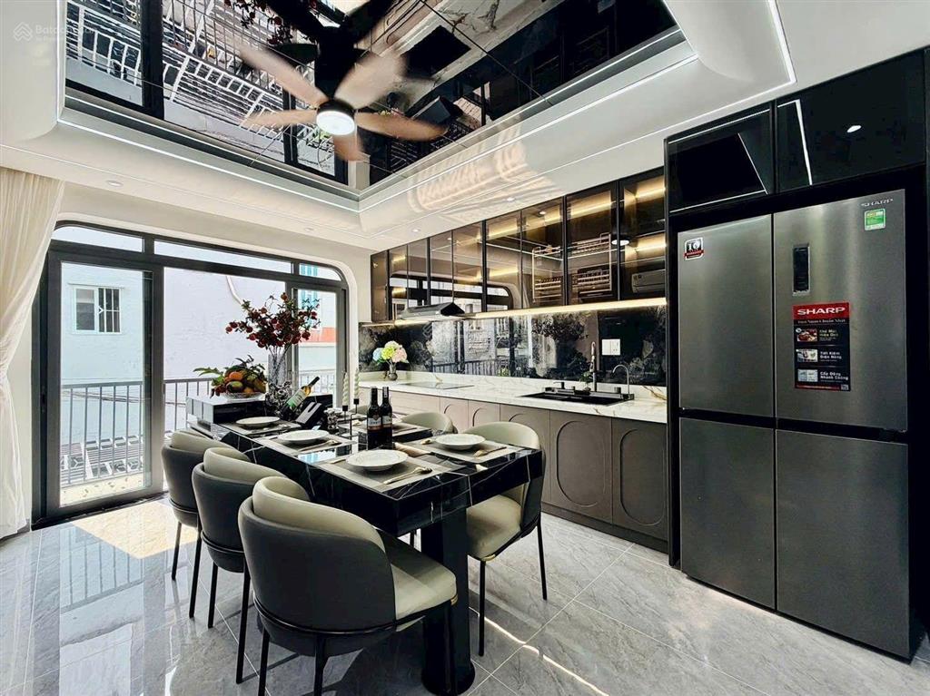 Nhà xây mới 5 tầng 60m2 hẻm xe hơi đường quang trung, gần emart 2