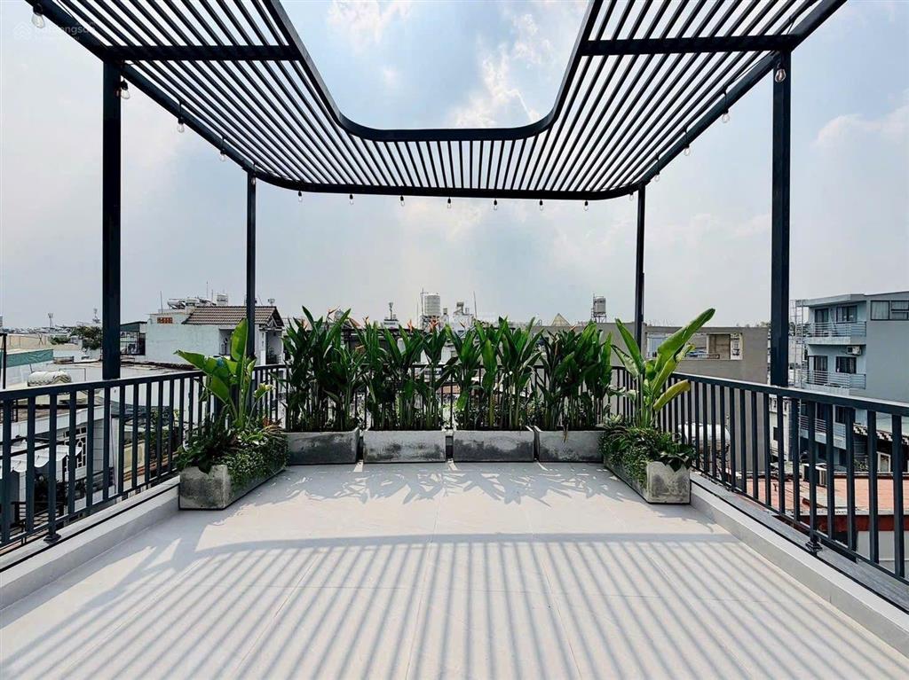 Nhà xây mới 5 tầng 60m2 hẻm xe hơi đường quang trung, gần emart 2