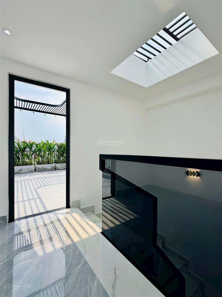 Nhà xây mới 5 tầng 60m2 hẻm xe hơi đường quang trung, gần emart 2
